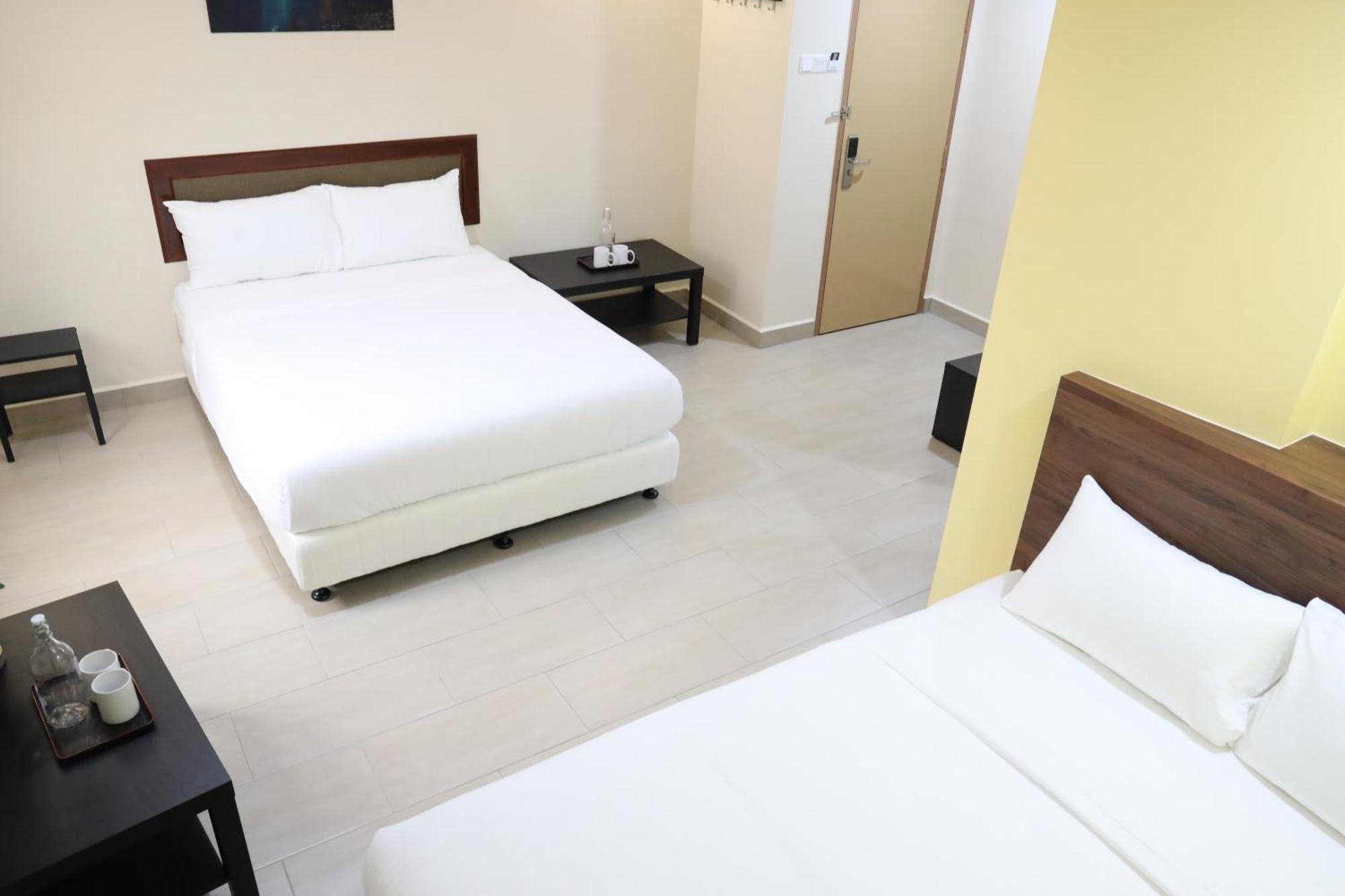 Capital O 90897 Island City Hotel Джорджтаун Экстерьер фото