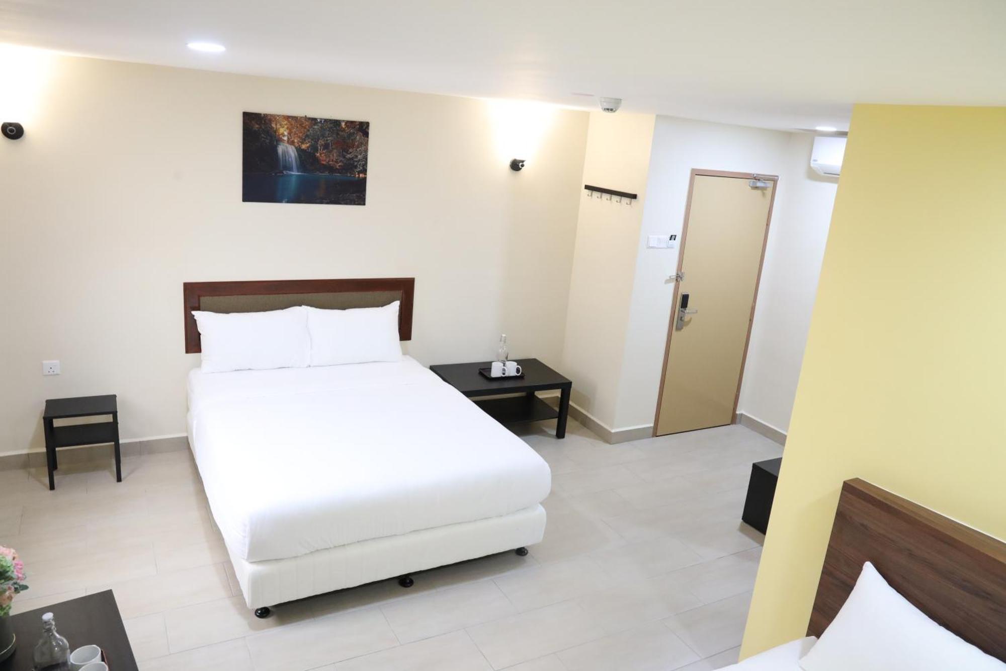 Capital O 90897 Island City Hotel Джорджтаун Экстерьер фото