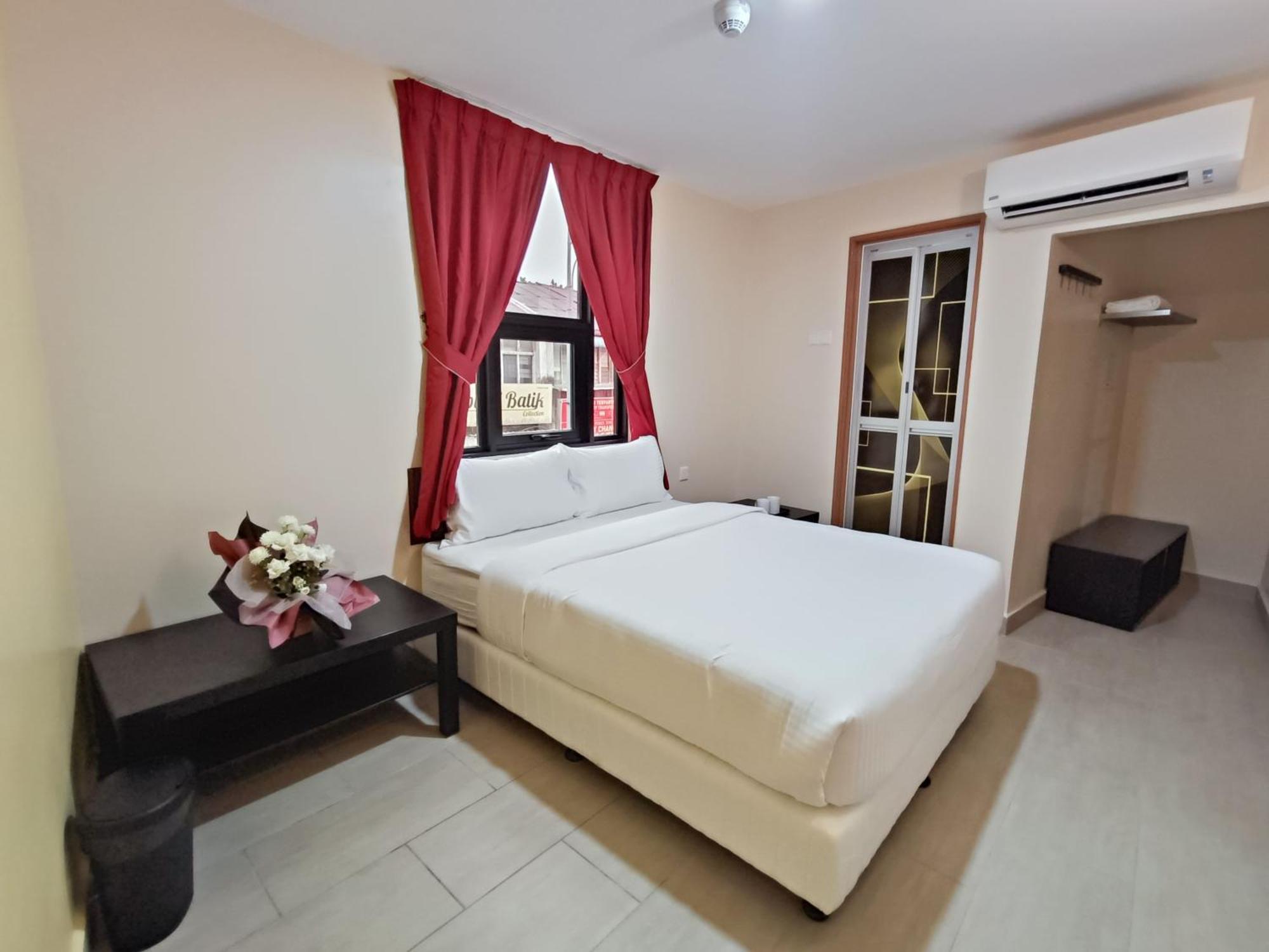 Capital O 90897 Island City Hotel Джорджтаун Экстерьер фото
