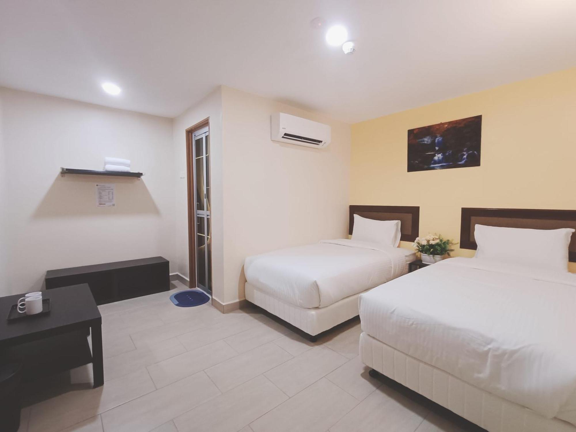 Capital O 90897 Island City Hotel Джорджтаун Экстерьер фото