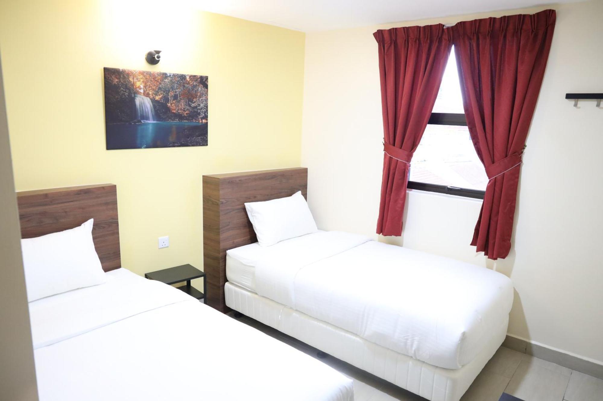 Capital O 90897 Island City Hotel Джорджтаун Экстерьер фото
