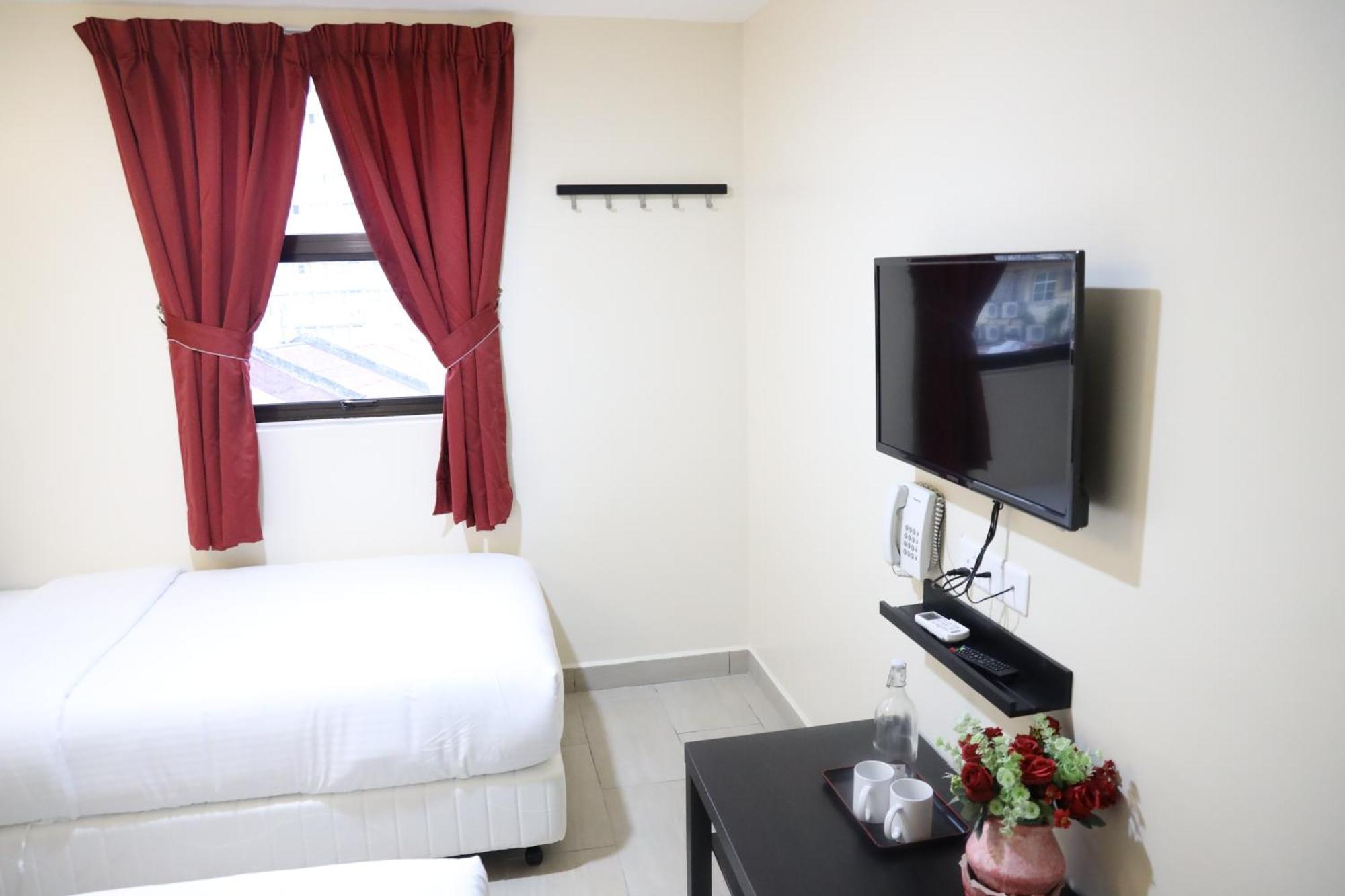 Capital O 90897 Island City Hotel Джорджтаун Экстерьер фото