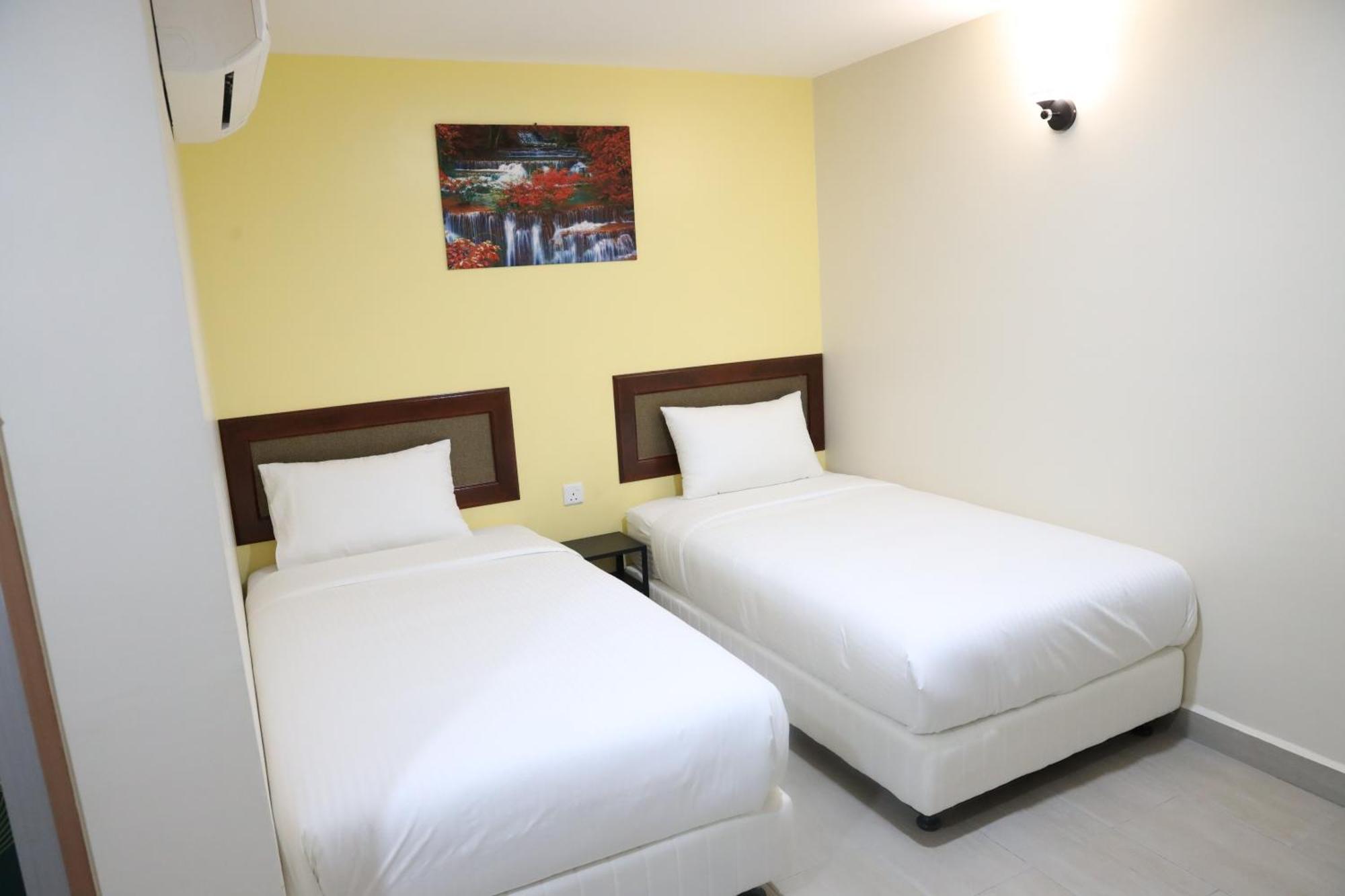 Capital O 90897 Island City Hotel Джорджтаун Экстерьер фото