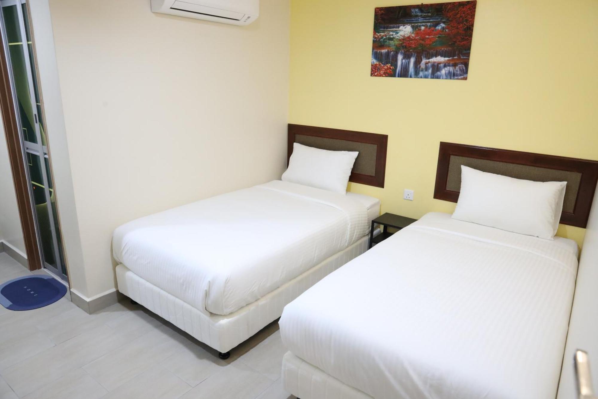 Capital O 90897 Island City Hotel Джорджтаун Экстерьер фото