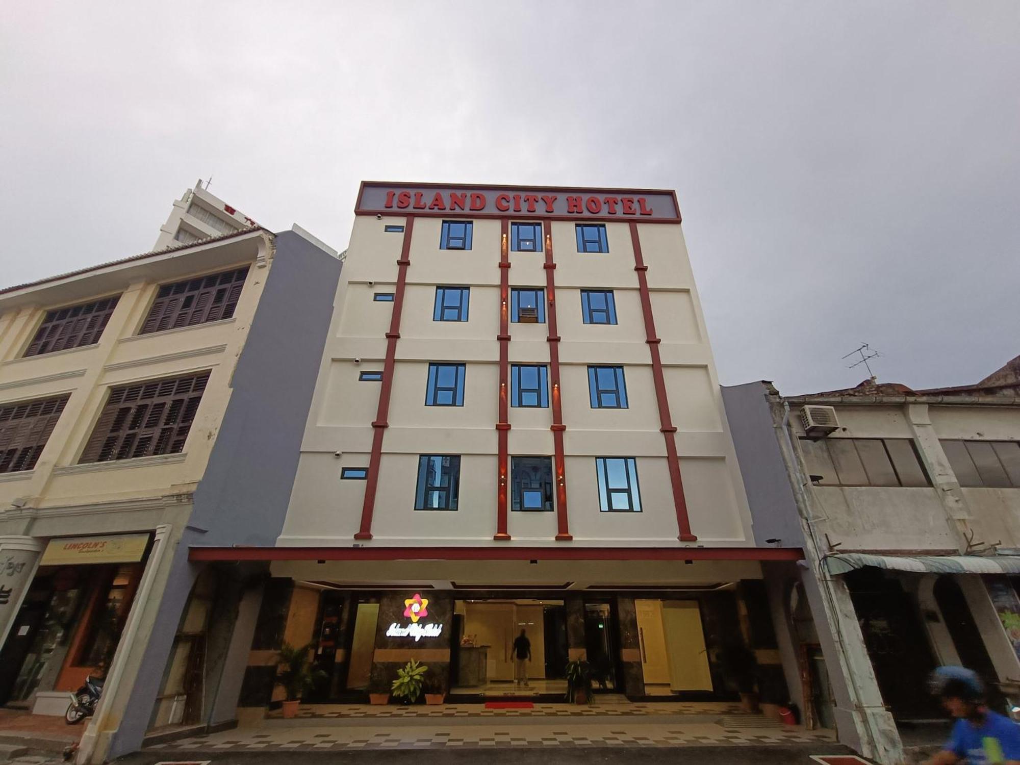 Capital O 90897 Island City Hotel Джорджтаун Экстерьер фото