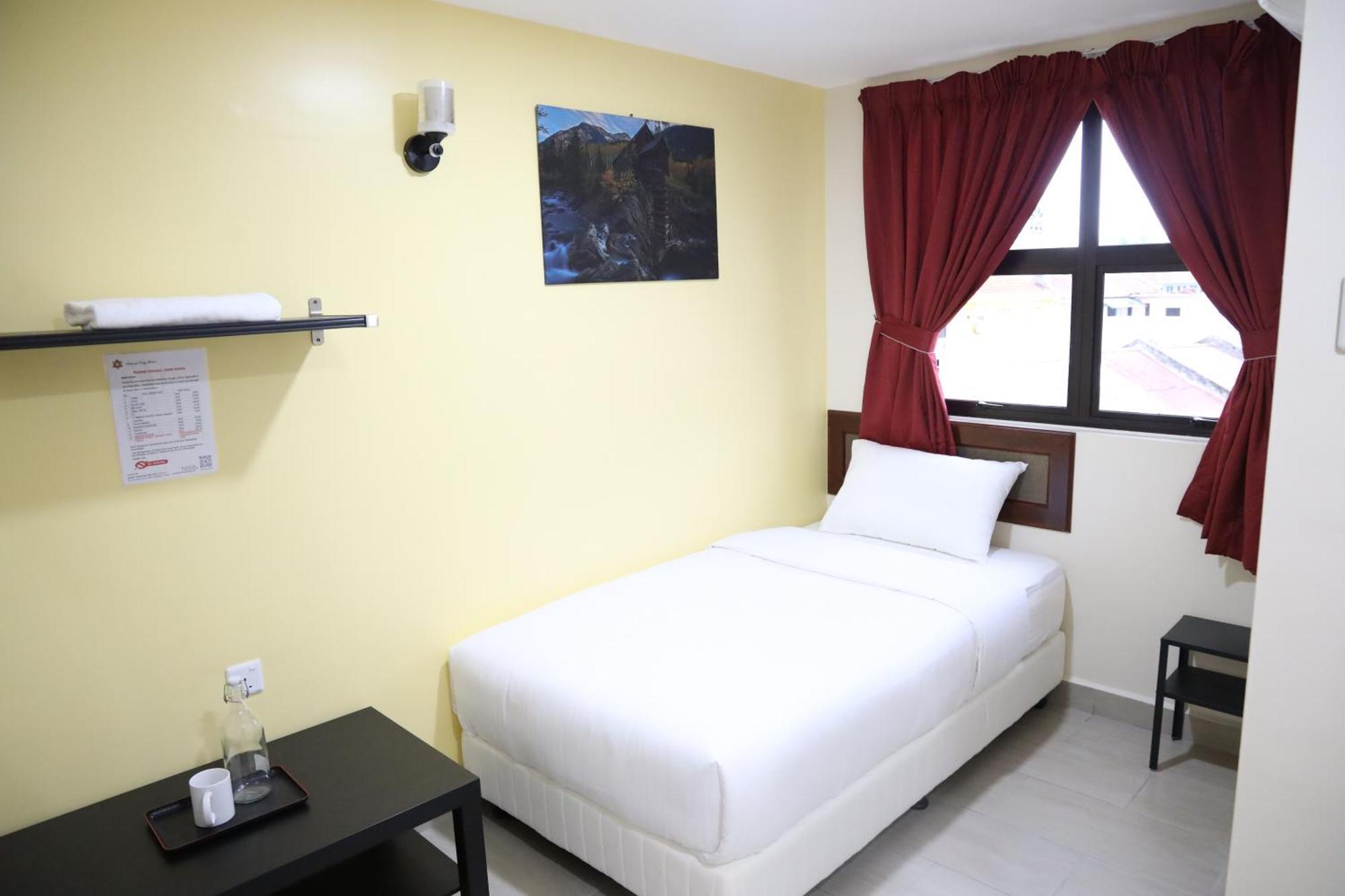 Capital O 90897 Island City Hotel Джорджтаун Экстерьер фото