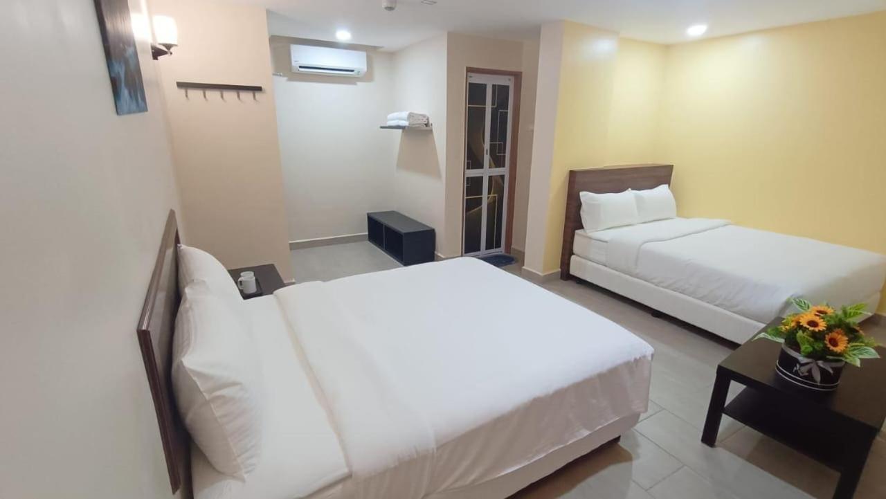 Capital O 90897 Island City Hotel Джорджтаун Экстерьер фото